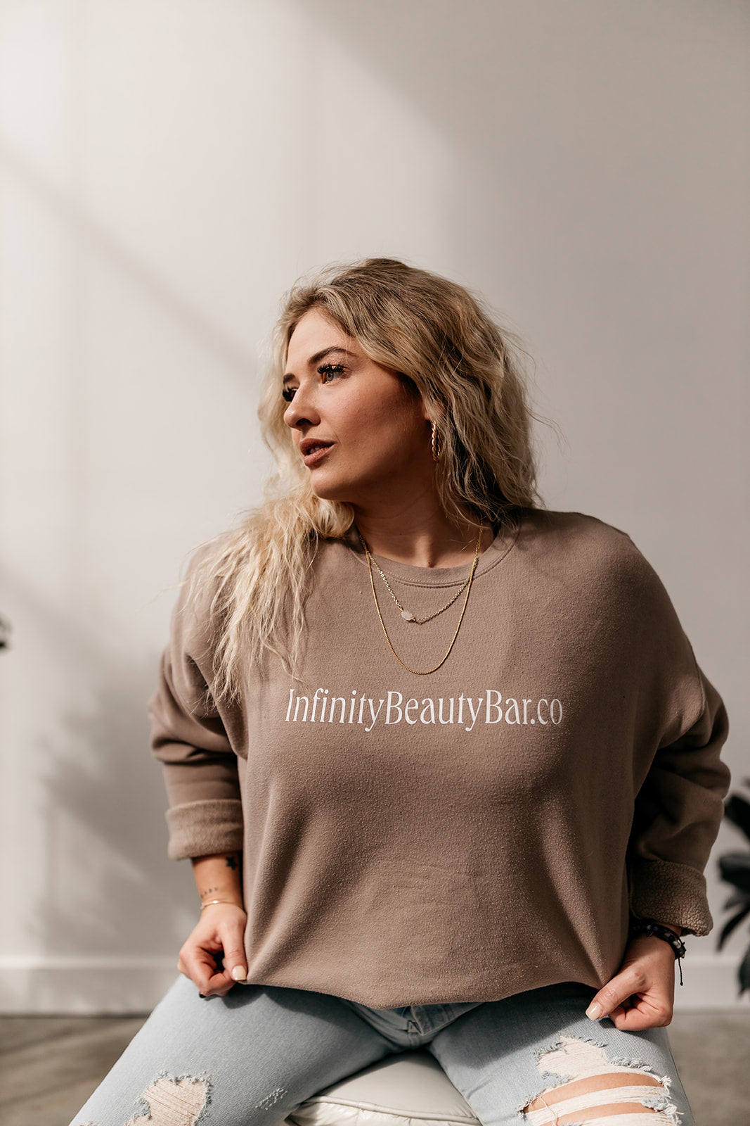 crew-neck-unisex-infinity-beauty-bar-sweatshirt