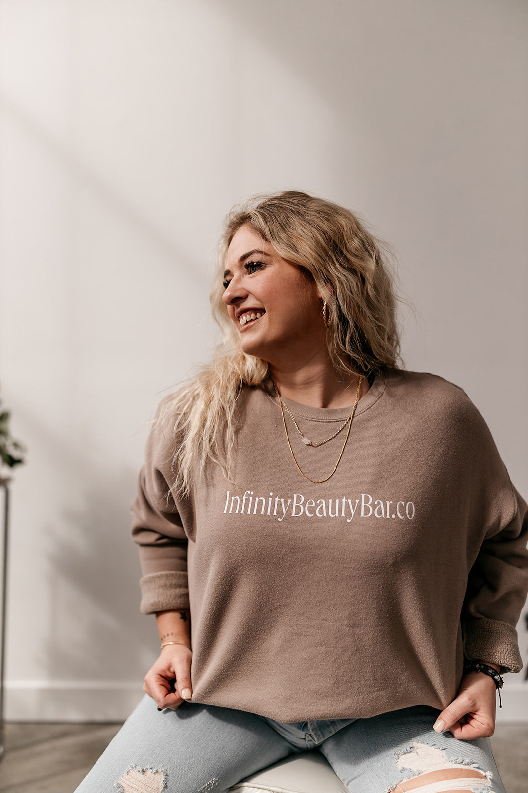 crew-neck-unisex-infinity-beauty-bar-sweatshirt