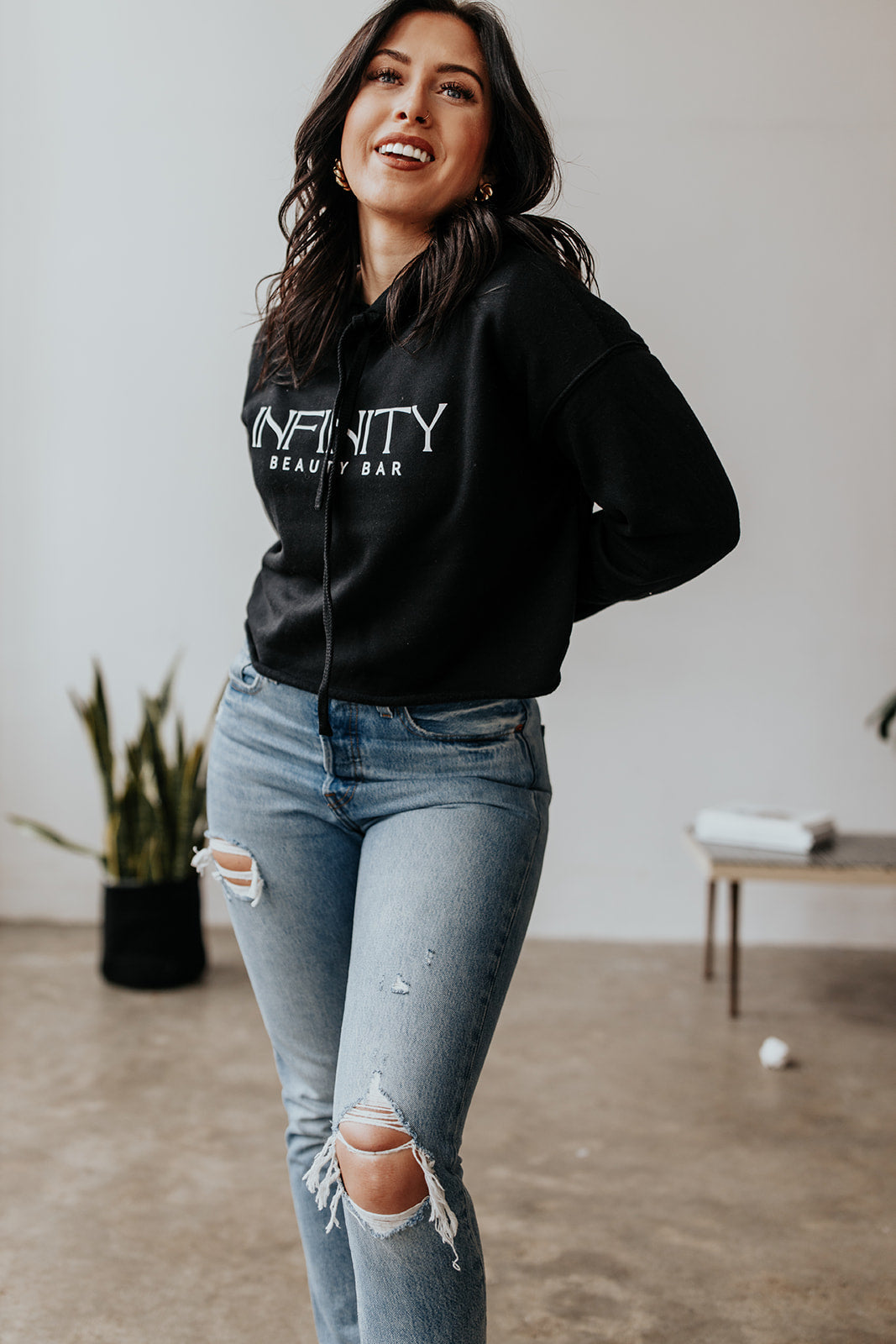 Cropped-hoodie-Infinity-Beauty-Bar-logo