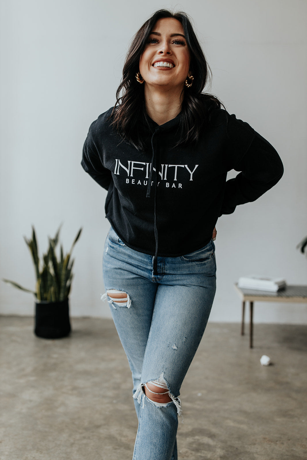 Cropped-hoodie-Infinity-Beauty-Bar-logo